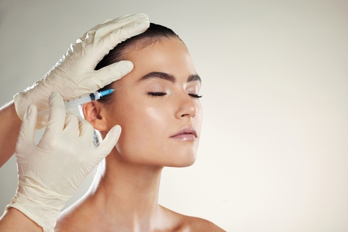 woman receiving aesthetic dermal injections