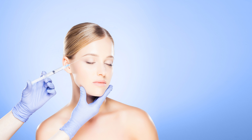 woman receiving medical aesthetic injections