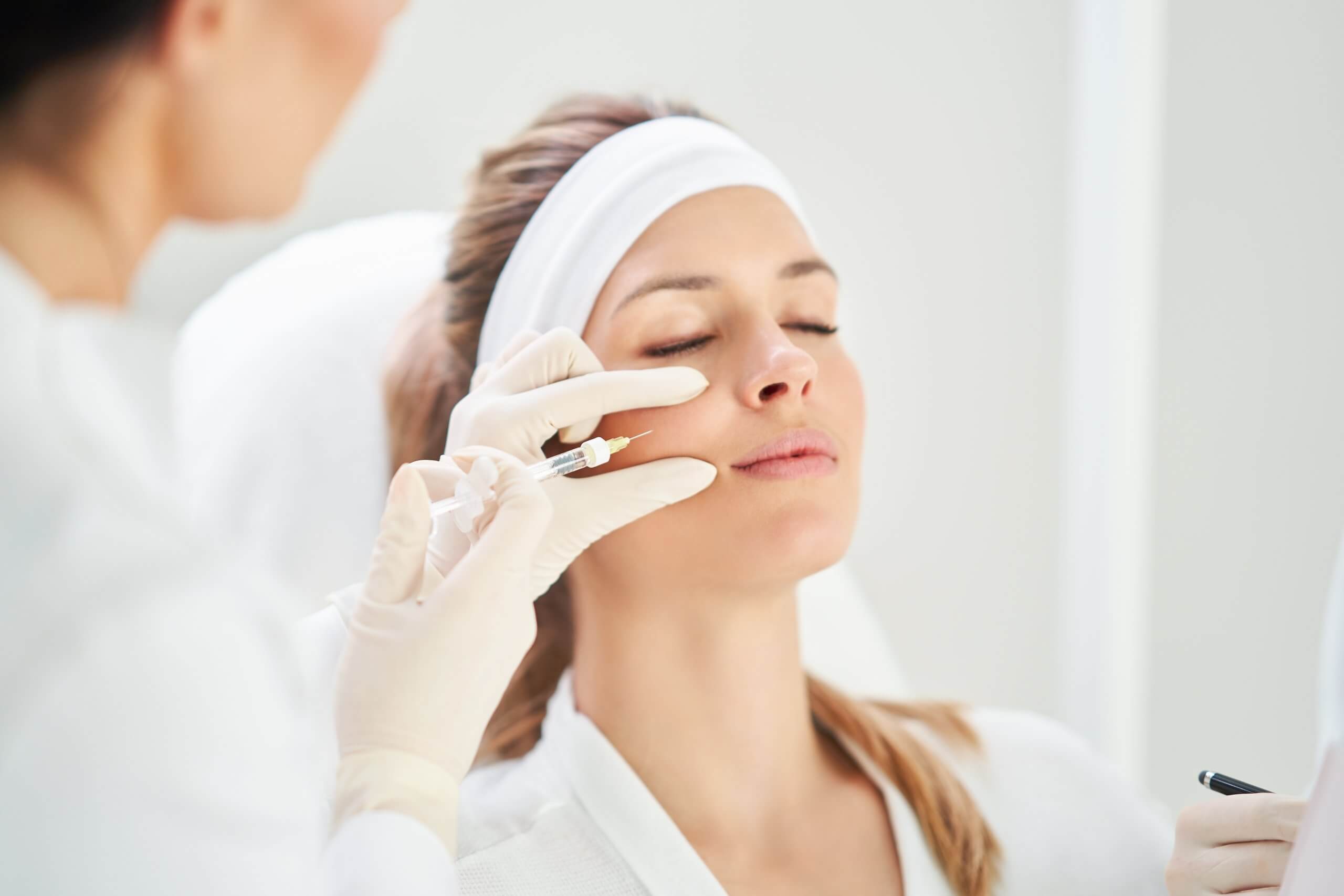 woman receiving Botox injections as training for cosmetic injectors