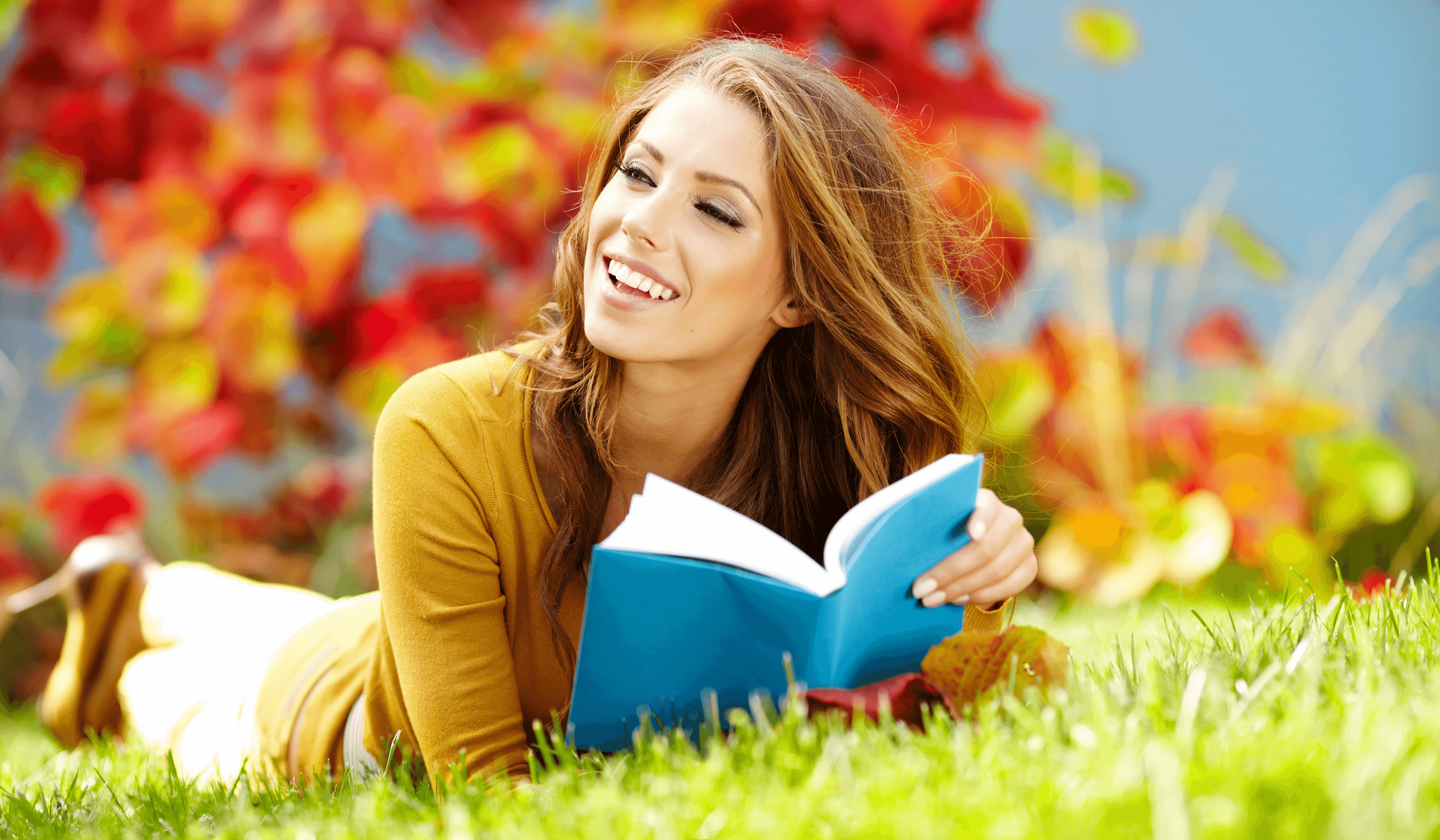 woman studying for a career change in the leaves