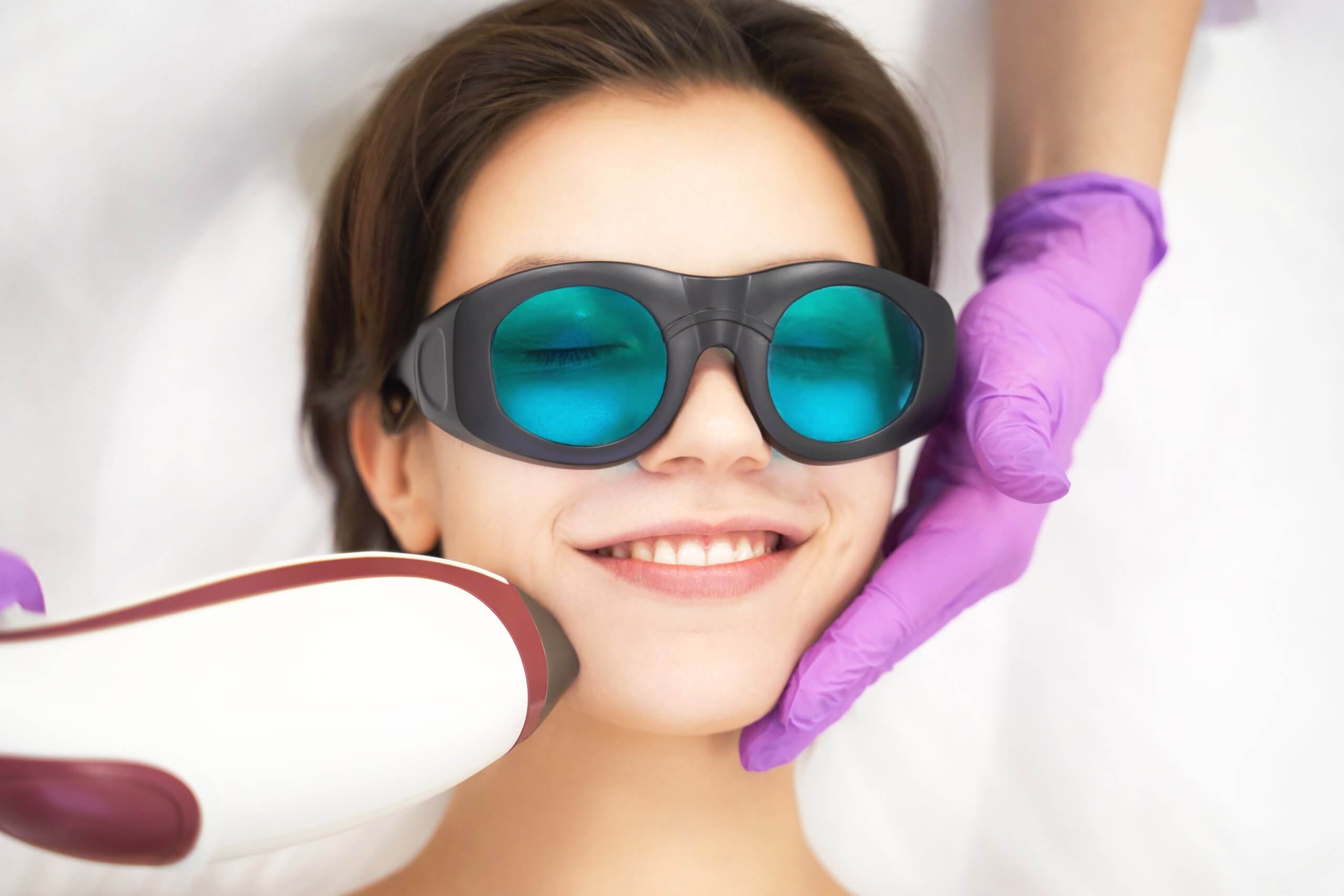 a woman experiences cosmetic laser treatments by a cosmetic laser technician training in nashville